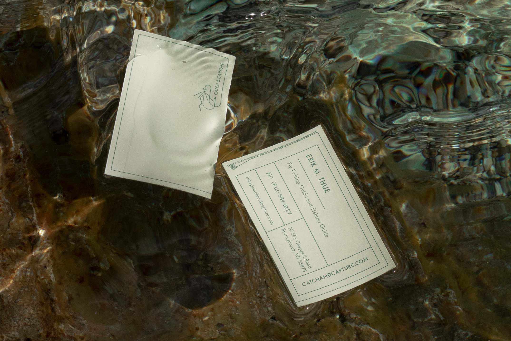 catch_&_capture_business_card_design_mockup_on_water_cropped_final