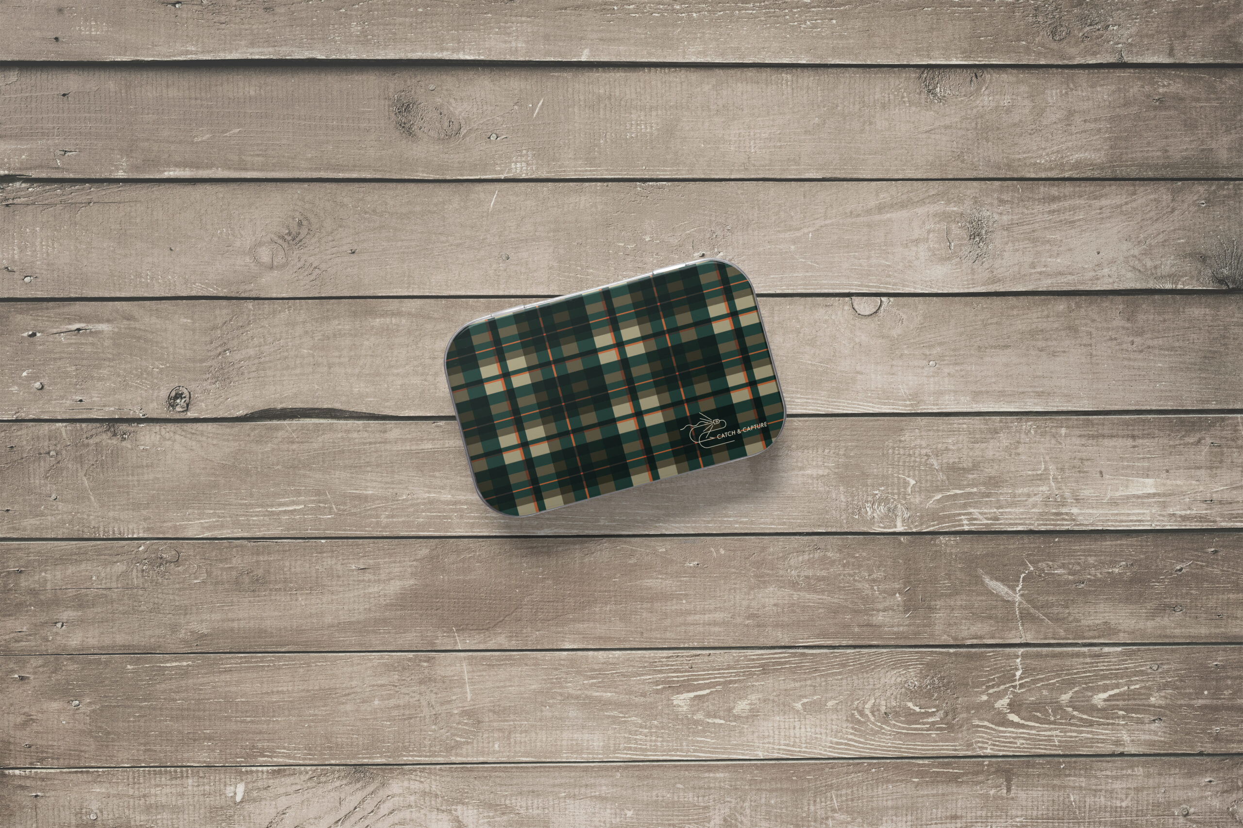 catch_&_capture_pattern_design_4_plaid_tin_box_on_wood_mockup_final